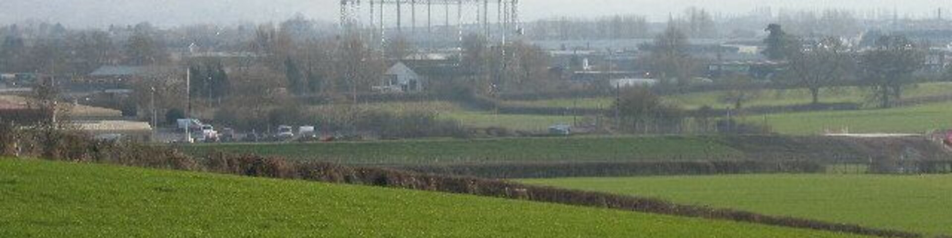 Bristol Road industrial area from Hempsted Village. Gasholder now redundant