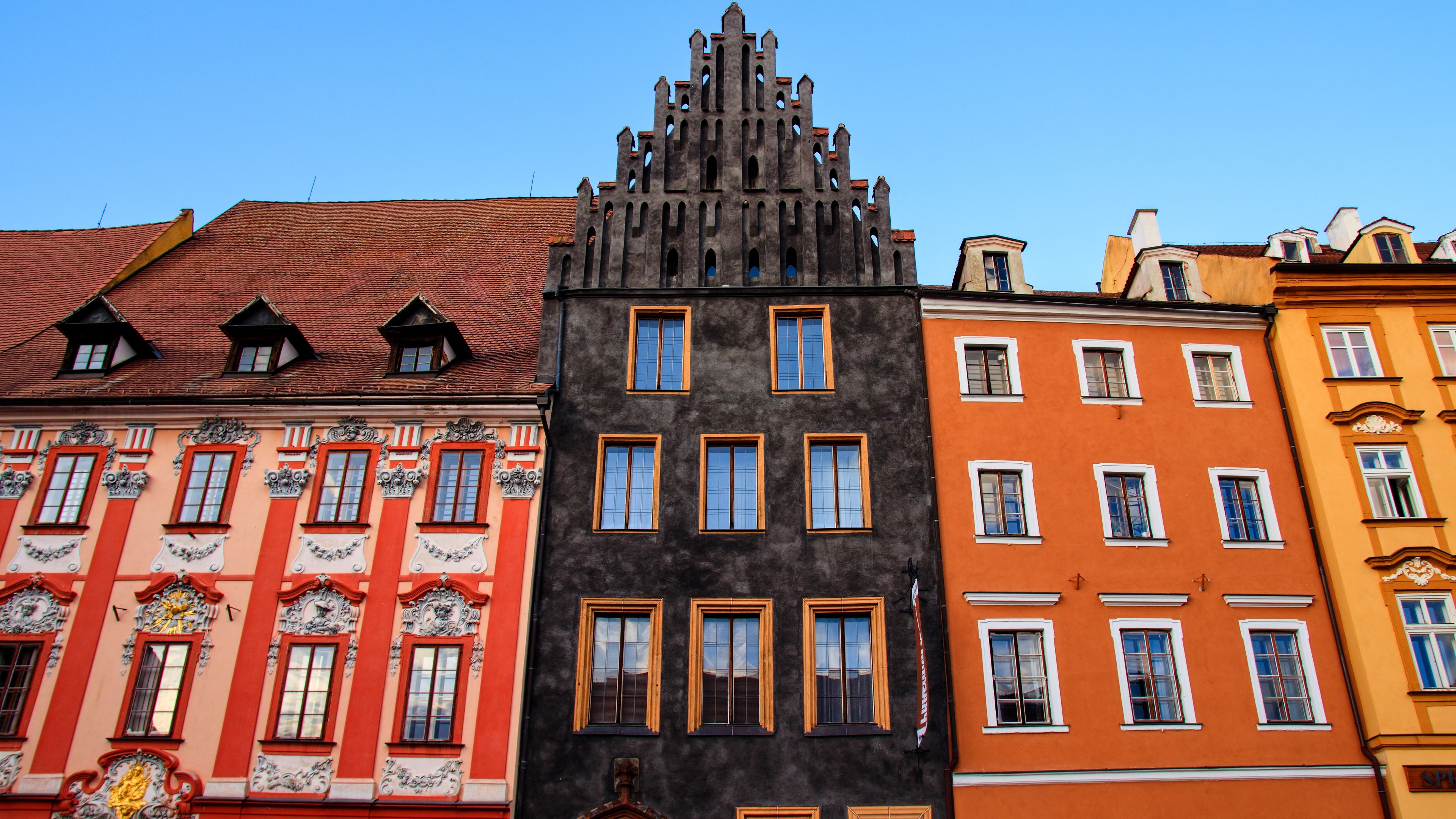 The historical buildings designed in original style at the square of city Cheb, Czech republic 