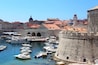 View over the city harbour in Dubrovnik. Boats regularly depart from here to a number of the islands.