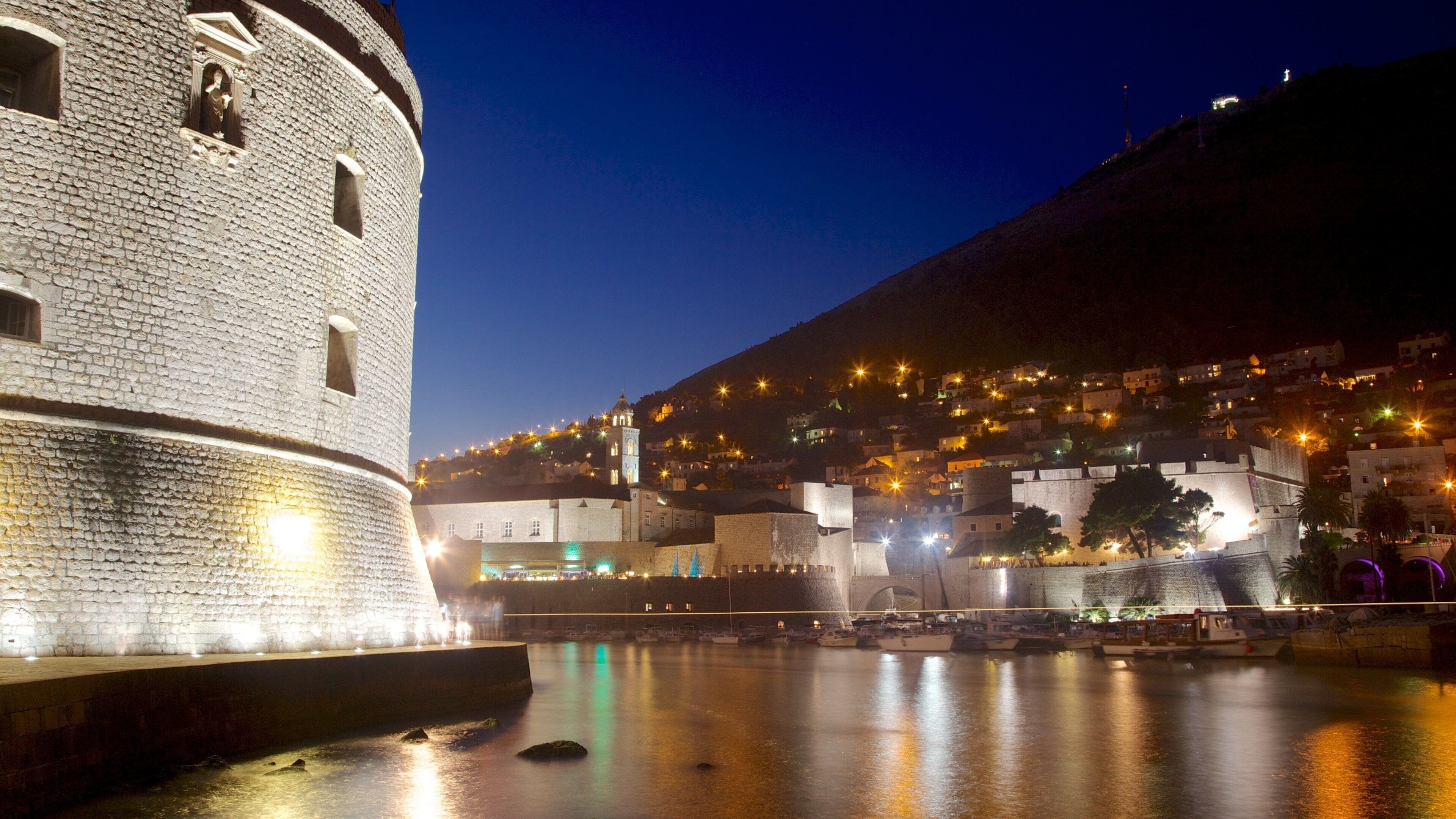 Dubrovnik - Southern Dalmatia showing night scenes, a bay or harbor and a coastal town