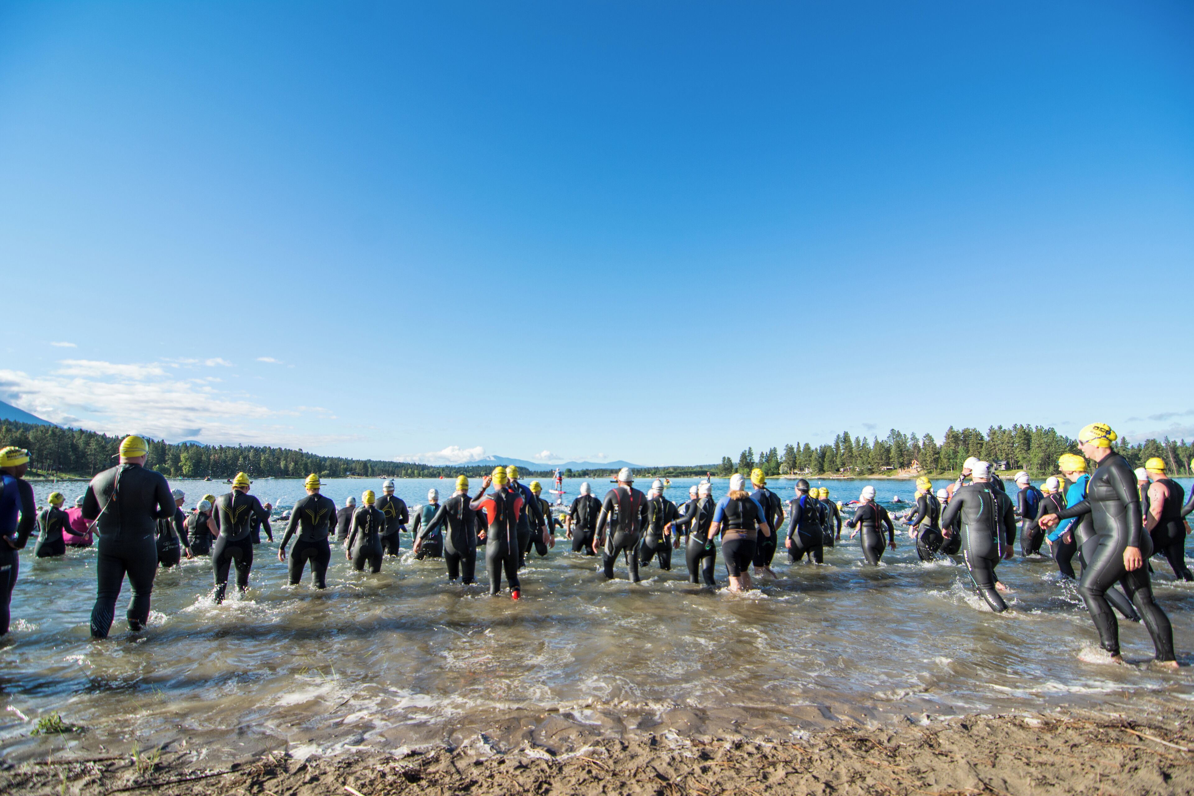 Swimmers brave the early summer swim in the epic Wasa Triathalon. #Adventure