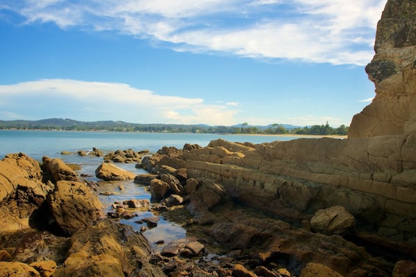 Batemans Bay showing rugged coastline and a bay or harbour