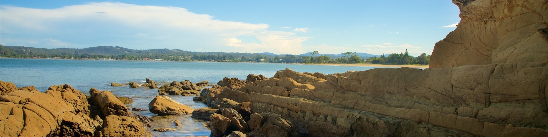 Batemans Bay showing rugged coastline and a bay or harbour