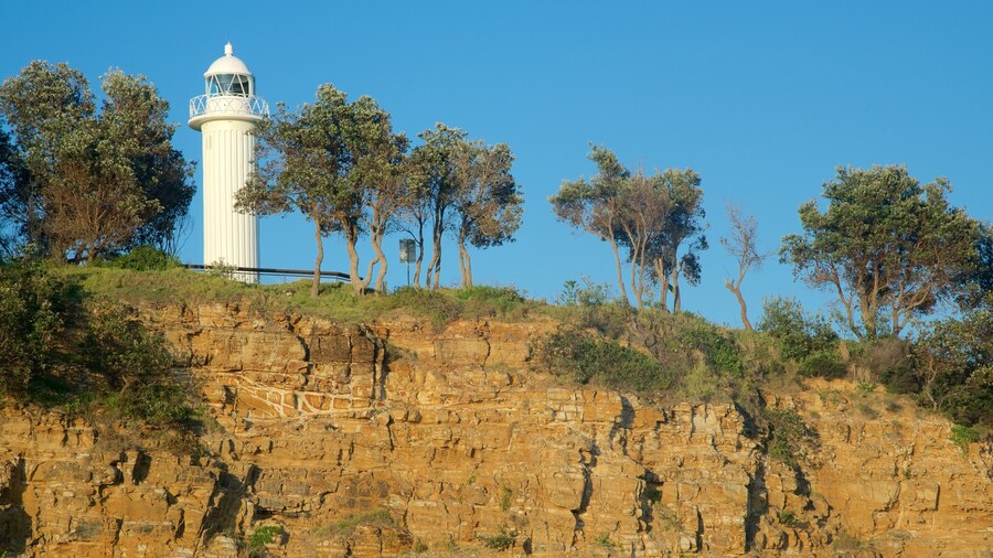 Yamba featuring rugged coastline and a lighthouse