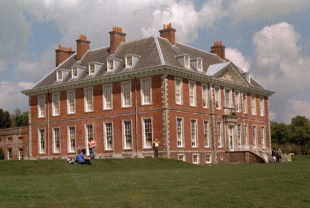 Uppark. Built 1690, with a fine view from the South Downs to the sea. HG Wells' mother was housekeeper here. It was severely damaged by fire in 1989 and only reopened in 1995 after extensive repairs. This is the main house: I think the geograph 18782 is of the former stable block