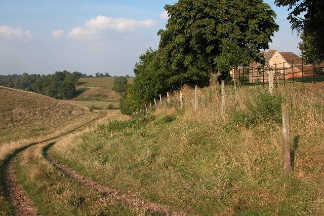 Footpath and Pauntley Court. Pauntley Court in Gloucestershire was the birth place of Dick Whittington, Mayor of London and pantomine inspiration. See: http://www.nndb.com/people/219/000103907/