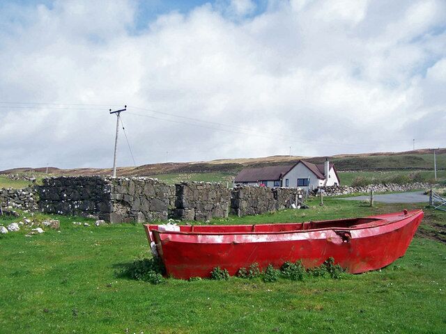 Boat, ruin, bungalow A scene close to the road junction between Ullinish and Eabost.