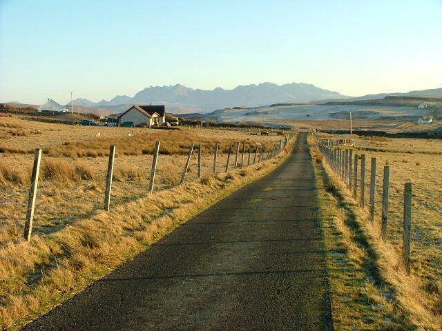Road from Eabost The Black Cuillin in the distance.
