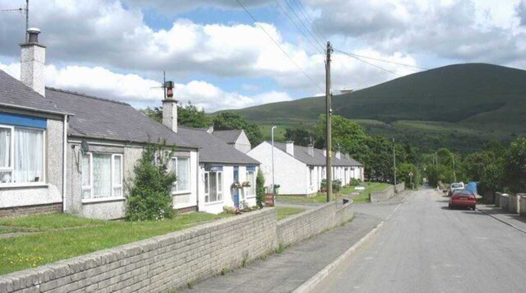 Tref Eilian Sheltered Housing Estate Tref Eilian means "Eilian's town". The mountain in the background, marked on the OS map as Moel Eilio, is called locally Moel Eilian.