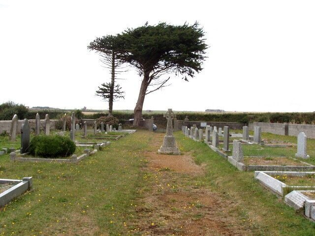 St Ervan non-conformist cemetery. The cross in the middle is the St Ervan parish war memorial. The cemetery is by itself among fields, away from the village of St Ervan.