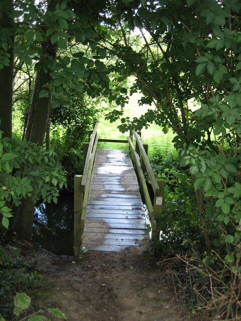 Footbridge over Dodnash Brook towards East End Coming south from Bentley and passing across the marsh where there are remains of Dodnash Priory, you cross this bridge before going up the footpath to the top of the next field