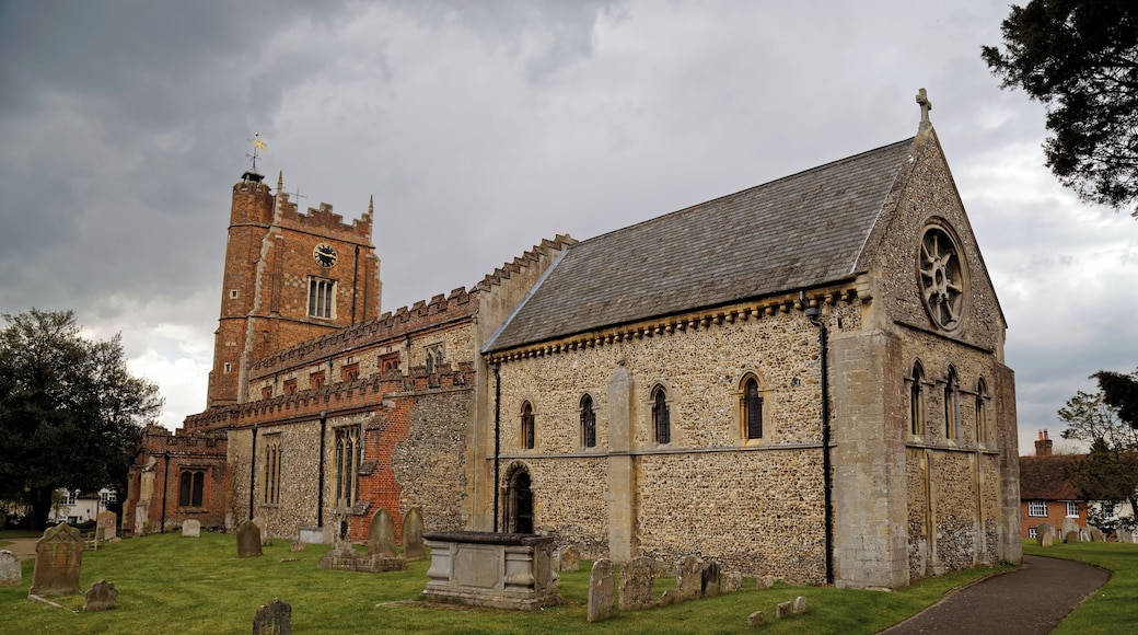 A south-east view of the churchyard, path, and Norman Romanesque chancel of St Nicholas' Church in Castle Hedingham in Essex, England. Camera: Canon EOS 6D with Canon EF 24-105mm F4L IS USM lens. Software: large RAW file lens-corrected, optimized and downsized with DxO OpticsPro 10 Elite, Viewpoint 2, and Adobe Photoshop CS2.