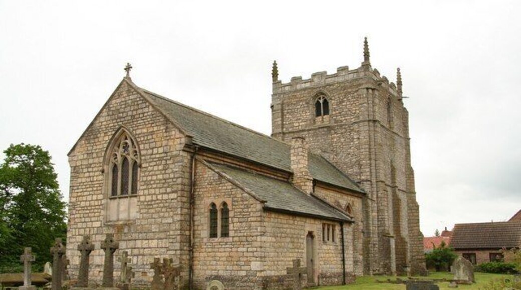 St.Radegunda's church Broad, low, squat 13th century tower, the rest of 1773, Gothicised by James Fowler in 1870