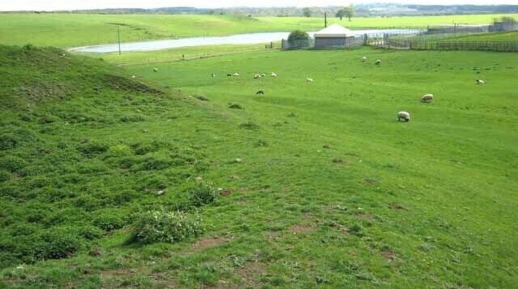 The "Durham Lakes" return! There is an extensive area of low-lying land in mid-southern County Durham, occupied at least in Roman times by lakes, now drained by the River Skerne and its tributaries. It is probable that the Romans used the lakes and interconnecting canals for water transport.http://www.davison03.freeserve.co.uk/the%20ancient%20lakes%20of%20county%20durham.htm . This view is taken from the low hill which marks the site of Bishop Middleham Castle and shows the Bishop Middleham sewage works. The water area beyond is punctuated by the tops of fence posts, which suggest that this is a temporary inundation rather than a new permanent lake, although recent weather has been fairly dry.