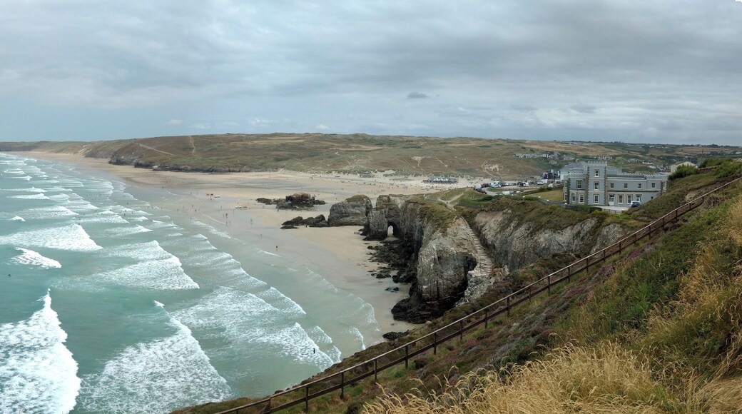 Perran Beach, near Perranporth, Cornwall, UK, at mid-tide, looking north. Ligger Point headland in the distance, on the left, Droskyn Castle hotel on the right, the town of Perranporth hidden behind it.