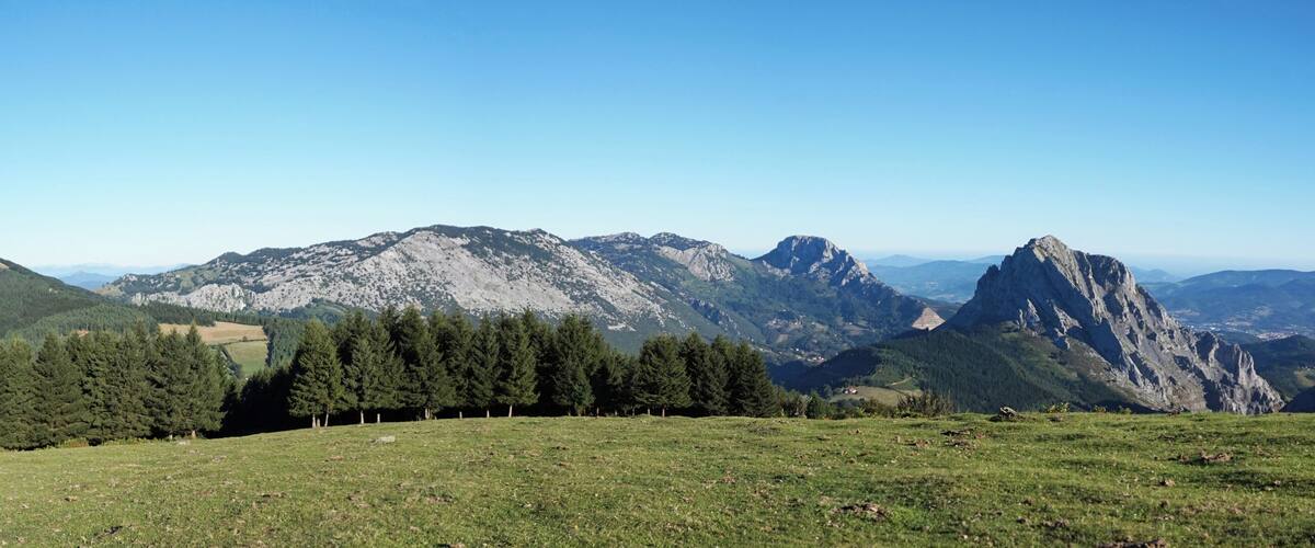A mountainous landscape with a clear sky.