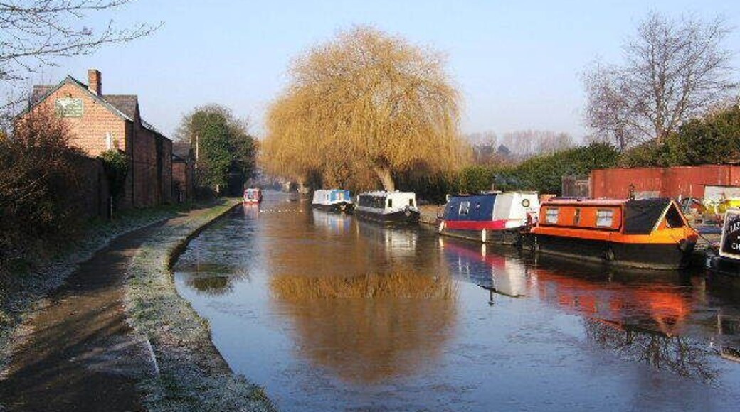 Crisp, Cold, Christleton Canal. Quite a frosty morning on the Shropshire Union Canal, near Christleton. A small marina on the right, with one of the boats showing signs of life, with smoke coming out of the chimney.