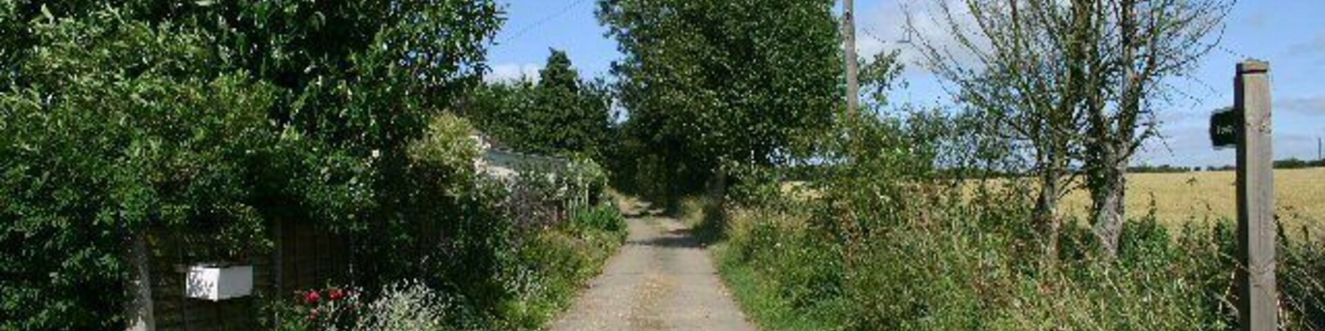 Footpath to Malting End. This path leads north-west from the A143 near Wickham Street.