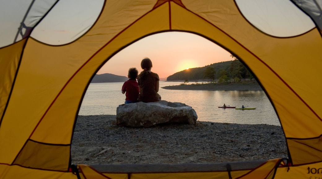 Lake Ouachita State Park showing a lake or waterhole, a sunset and camping