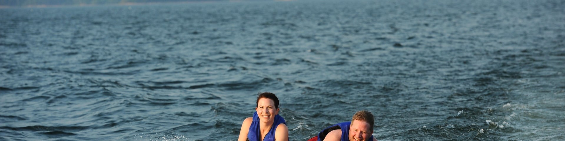 Lake Ouachita State Park showing a lake or waterhole and watersports as well as a couple