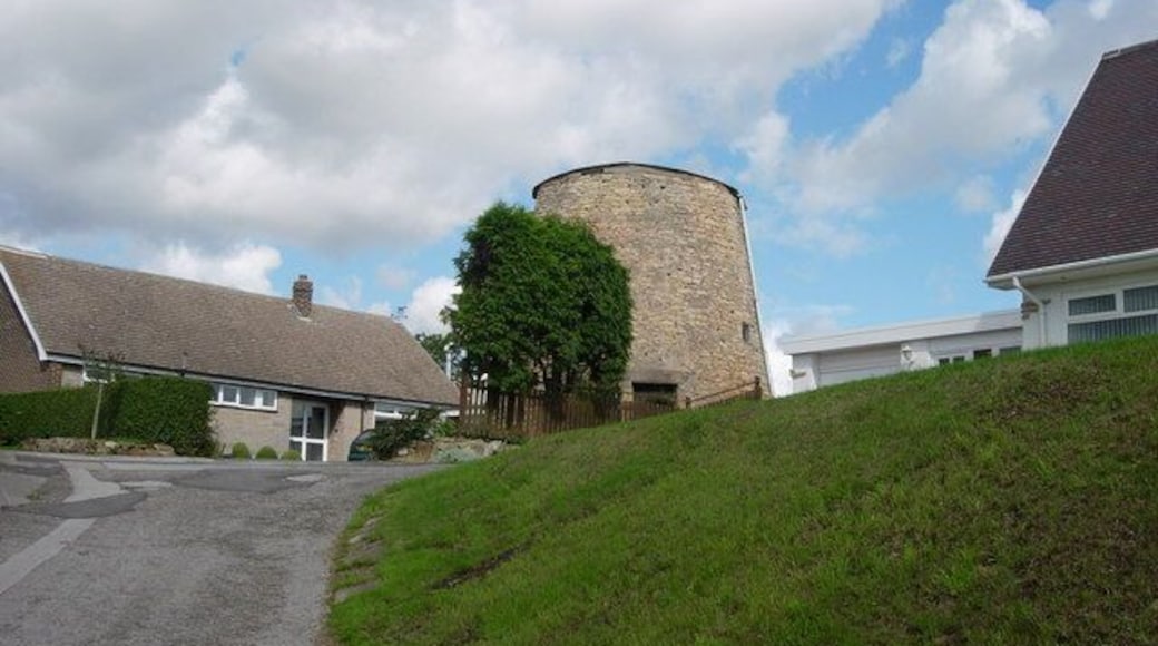 Upton tower mill, West Yorkshire Stump of a tower mill near the water tower on Beacon Hill in the grounds of "Adastra" house.