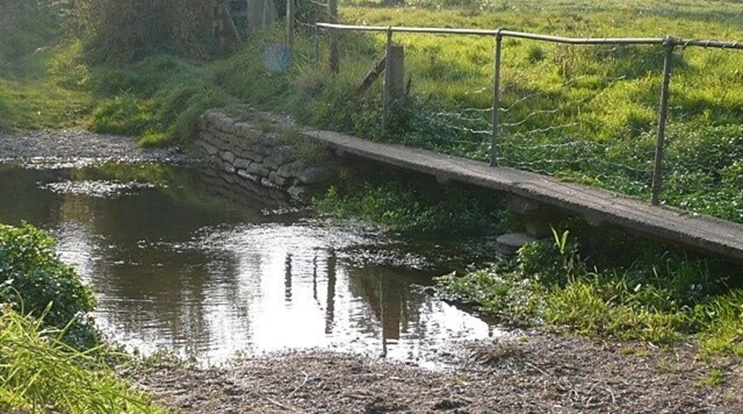 River Pang An infant River Pang flows under a walkway and through a ford adjacent to the house called St. Abb's.