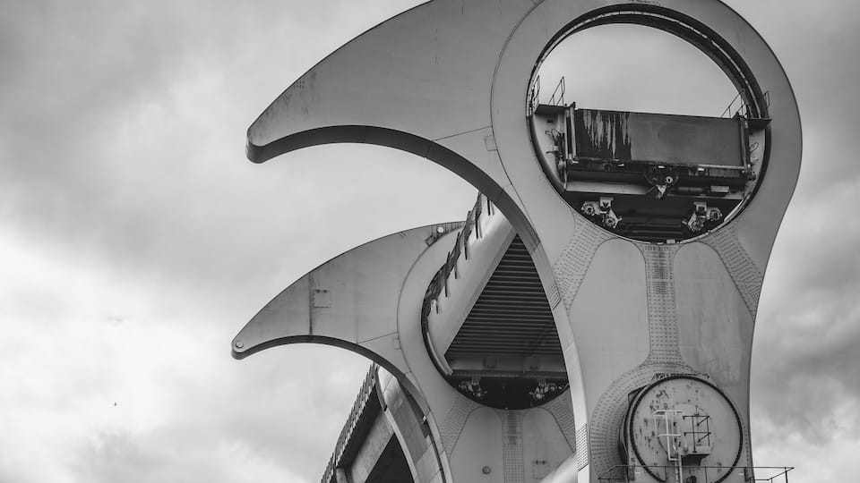 Close up detail of the Falkirk wheel in black and white on a cloudy gloomy day