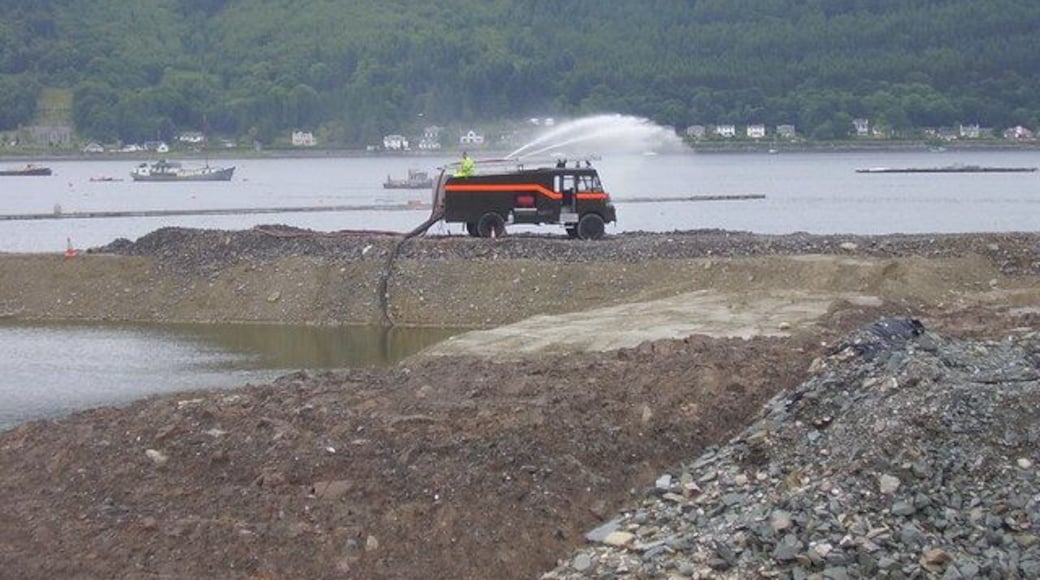 Sandbank marina Ex Army Green Goddess pumping sea water from land reclaimed from the sea. When complete this will greatly extend Holy Loch marina.