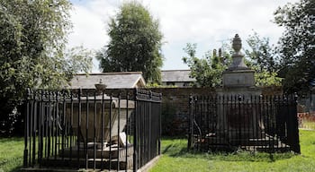 Fenced finial-ed table tombs in St Peter's churchyard in the village of St Peter's in the civil parish of Broadstairs and St Peter's in Kent, England. Software: RAW file lens-corrected, optimized and converted to JPEG with DxO OpticsPro 10 Elite, and likely further optimized and/or cropped and/or spun with Adobe Photoshop CS2.