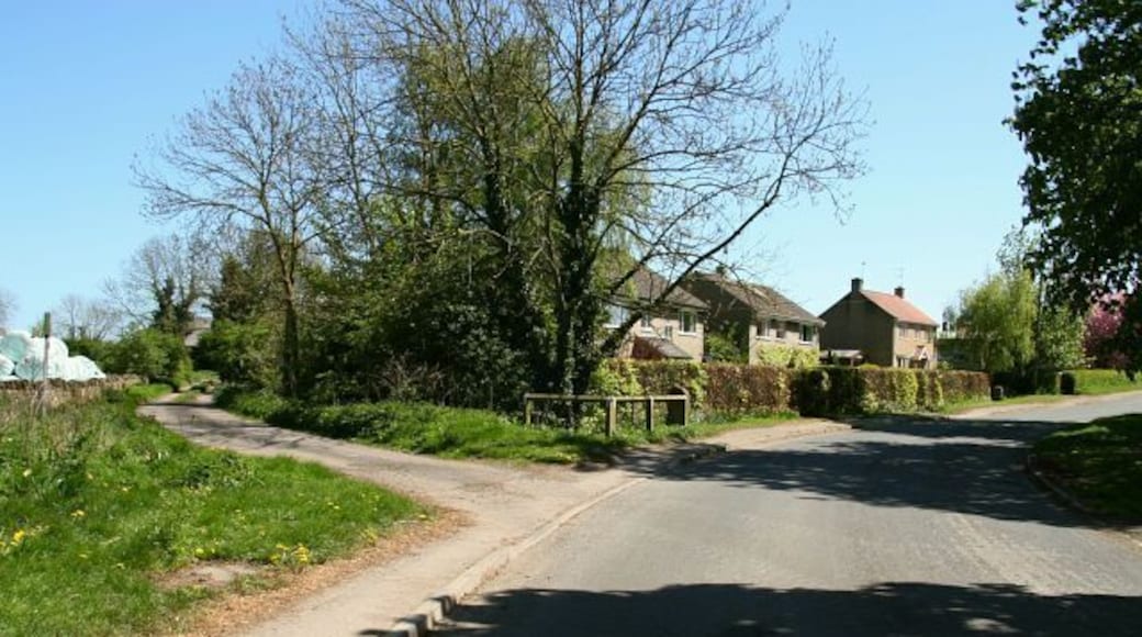 Ings Lane. Ings Lane (further south called Brompton Ings Road) connects Brompton By Sawdon with High Street, Sherburn (A64). This photograph is looking in a southerly direction from near Brompton Butts (behind and right of the viewpoint). The lane on the left is Acres Lane. A public footpath follows this lane to its end and then crosses fields in an easterly direction to Hudgin Lane near Wykeham Abbey. For a more southerly (ahead) photograph of Ings Lane, click here 430777. For a photograph of Ings Lane taken from approximately the same viewpoint but looking in the opposite (northerly) direction, click here 430709.
