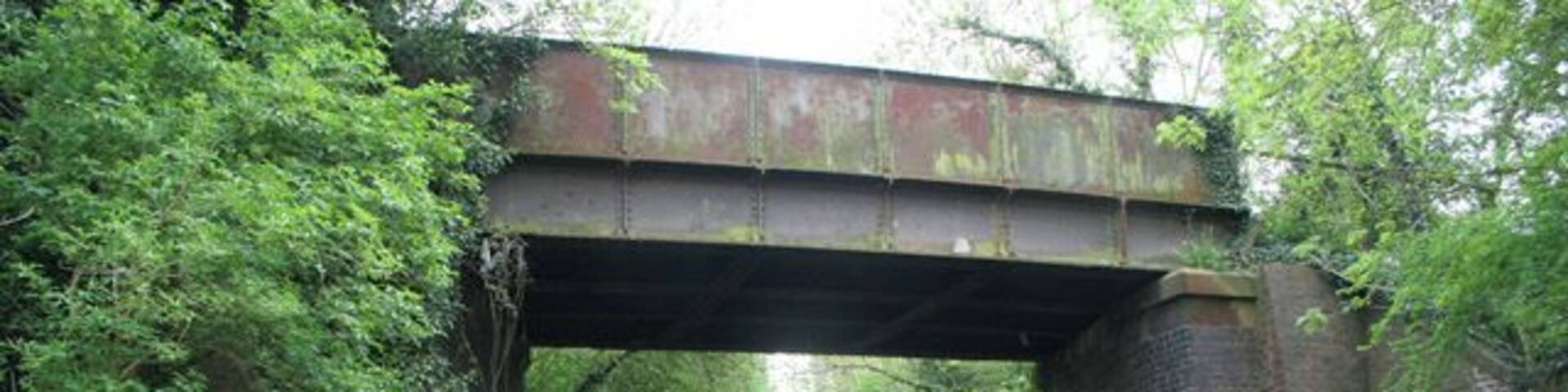 Copt Oak Road, Narborough. Old railway bridge, now carrying a public walkway, Whistle Way, across the road. The bridge is right on the featured square's southern boundary.
