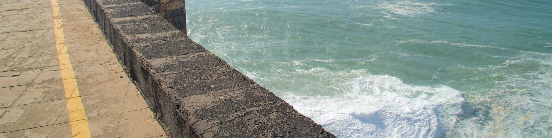 Nazaré Lighthouse which includes views, general coastal views and a lighthouse