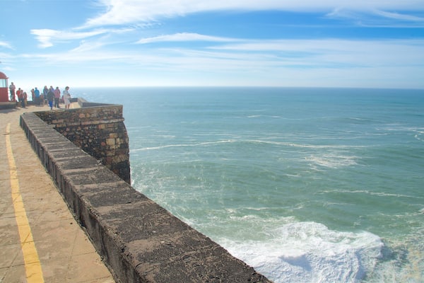 Nazaré Lighthouse which includes views, general coastal views and a lighthouse