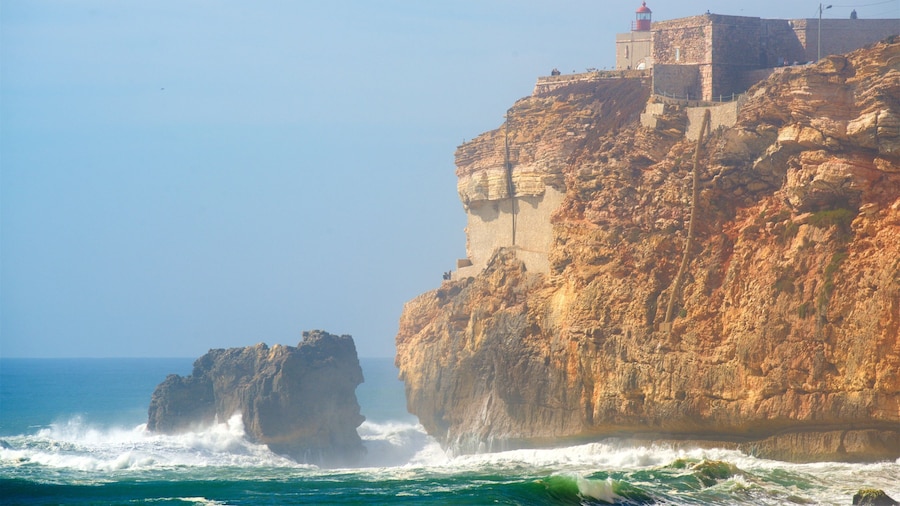 Nazare featuring general coastal views, surf and rugged coastline