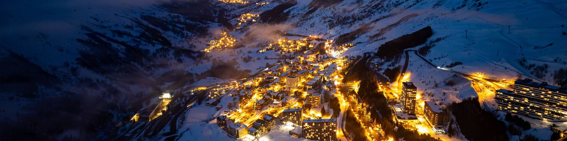 Aerial view of Les Menuires in Les Trois Vallees or The 3 Valleys at sunset