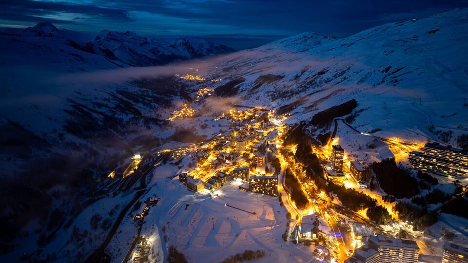 Aerial view of Les Menuires in Les Trois Vallees or The 3 Valleys at sunset