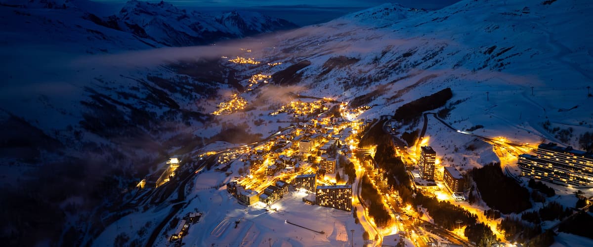 Aerial view of Les Menuires in Les Trois Vallees or The 3 Valleys at sunset