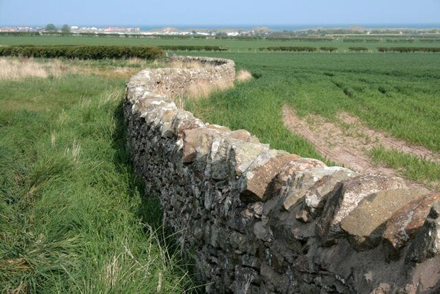 Wall, Swinhoe Aligning the B1340; Beadnell in the distance.