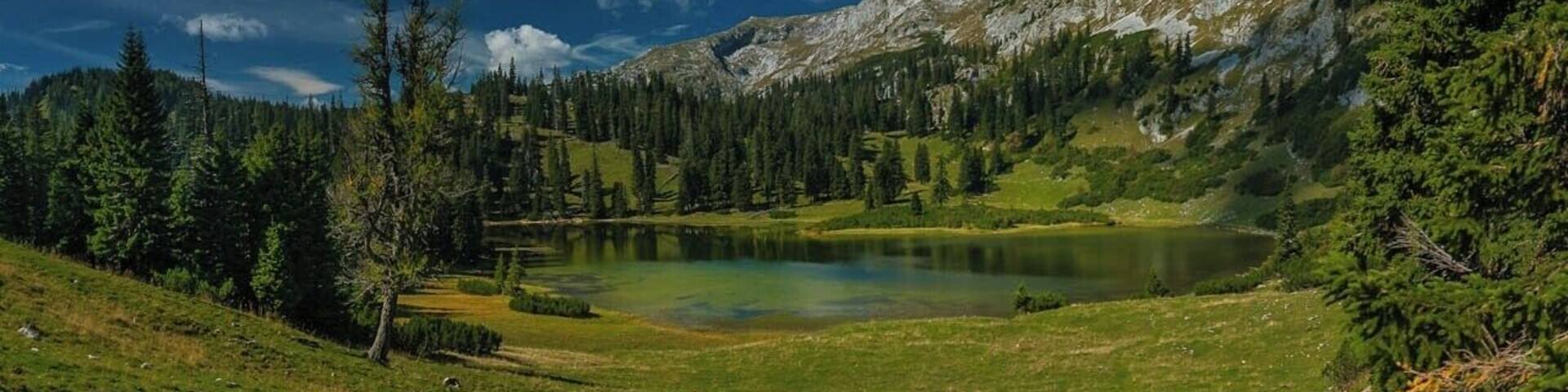September 2016
Sackwiesensee, Hochschwab, Steiermark land, Austria
Sackwiesensee is a small hidden mountain lake just under the main ridge of Hochschwab mountain range. It is located in altitude of 1.414 meters. It is few hours hike southwest from the Schiestlhaus and totally worth due to the variable countryside (barren limestone plateau with grassy meadows, green scrub pine forrests, classical mountain forrests) and less crowded hiking routes (namely ať the end of the season). Sackwiesensee offers a great natural swimming opportunity, although it is quite cold being a mountain lake.