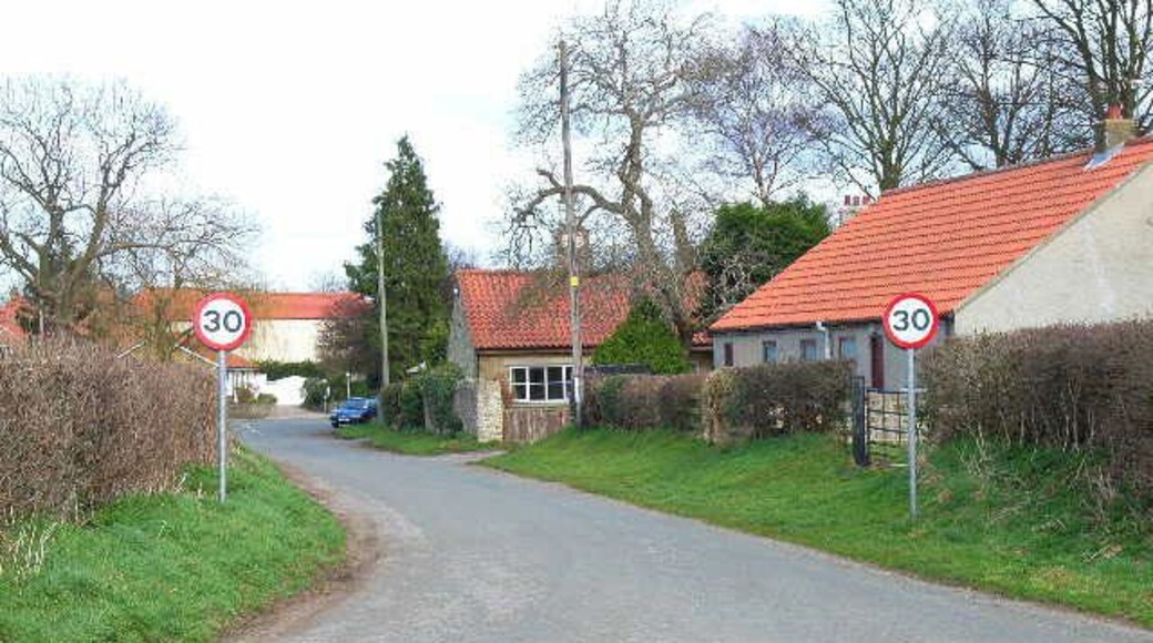 Scorton - the old road to Catterick. The 1940s map clearly shows that the B6271 left Scorton by the north-west corner of the green. This has now been replaced by a new road leaving the village to the south-west, leaving the pictured road as a cul-de-sac. Looking east.