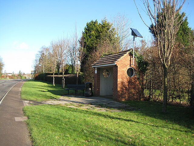 Bus shelter with solar panel On the A417 at Corse.