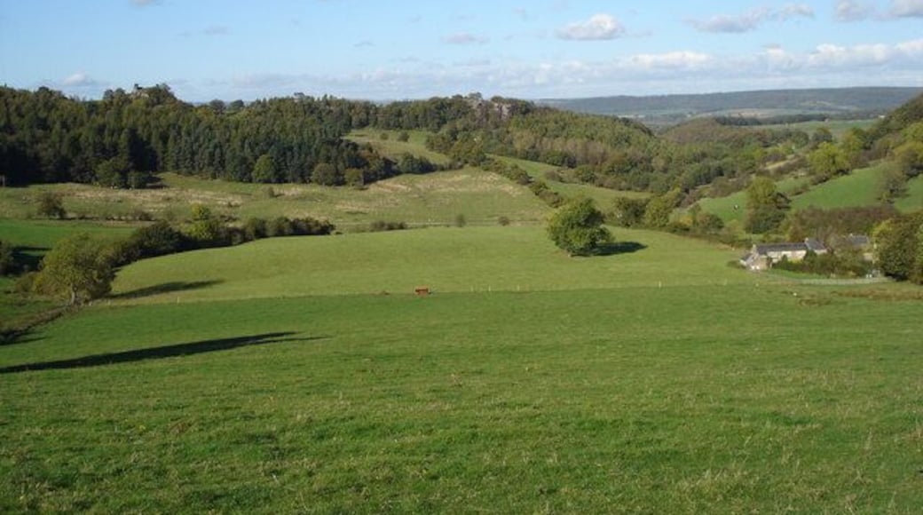 Ancient Landscape From this footpath there is a fine view to Dudwood, a name mentioned in documents in the late 1500's. The houses, bottom right stand by Dudwood Lane, which is also the Limestone Way long distance path, and date from 1737, (on an engraved plaque).