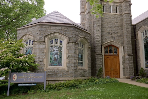 Princeton United Methodist Church showing signage, a church or cathedral and heritage elements