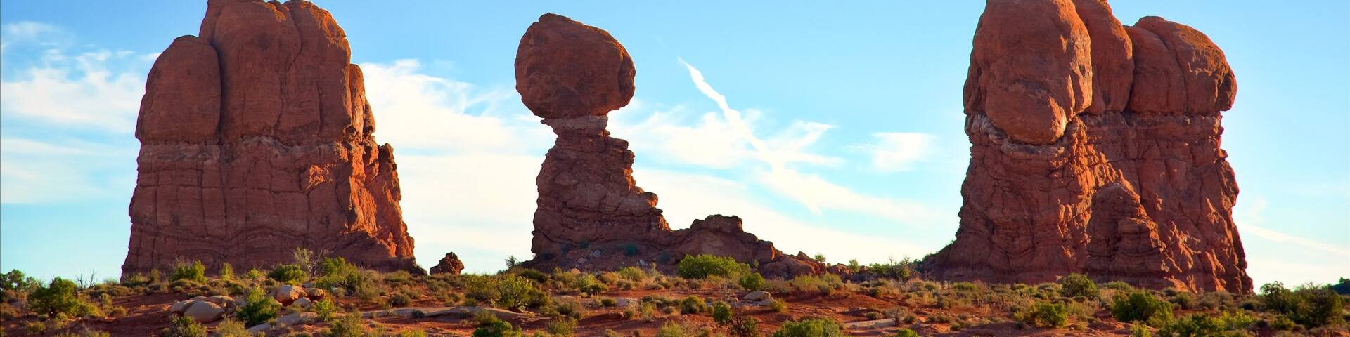 Arches National Park which includes desert views, tranquil scenes and a gorge or canyon