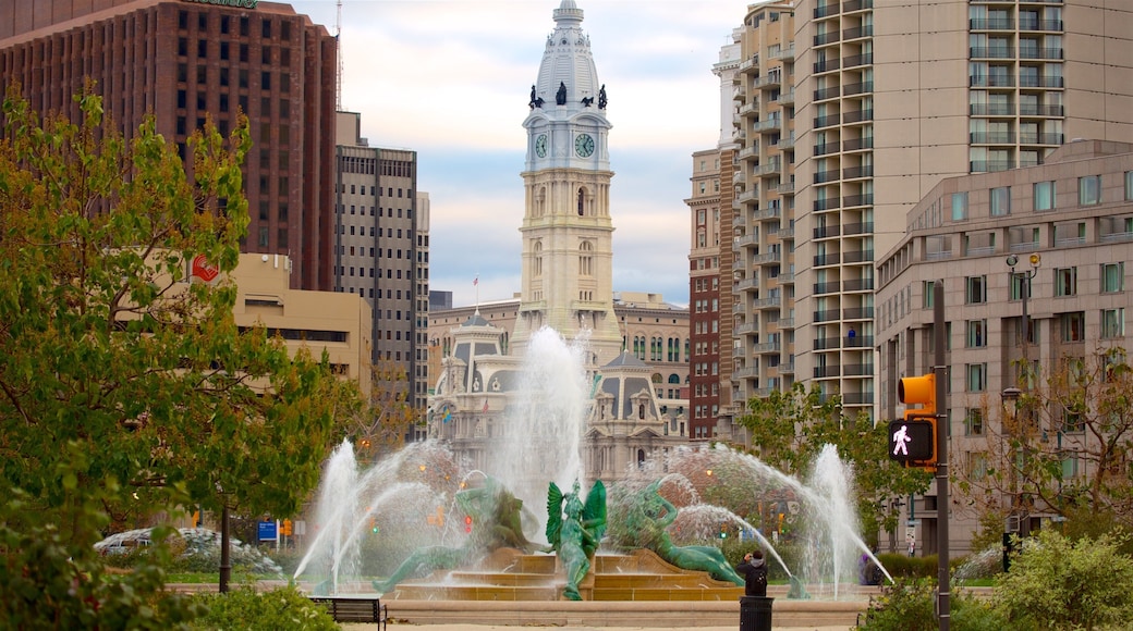 Benjamin Franklin Parkway featuring heritage architecture, a fountain and a city