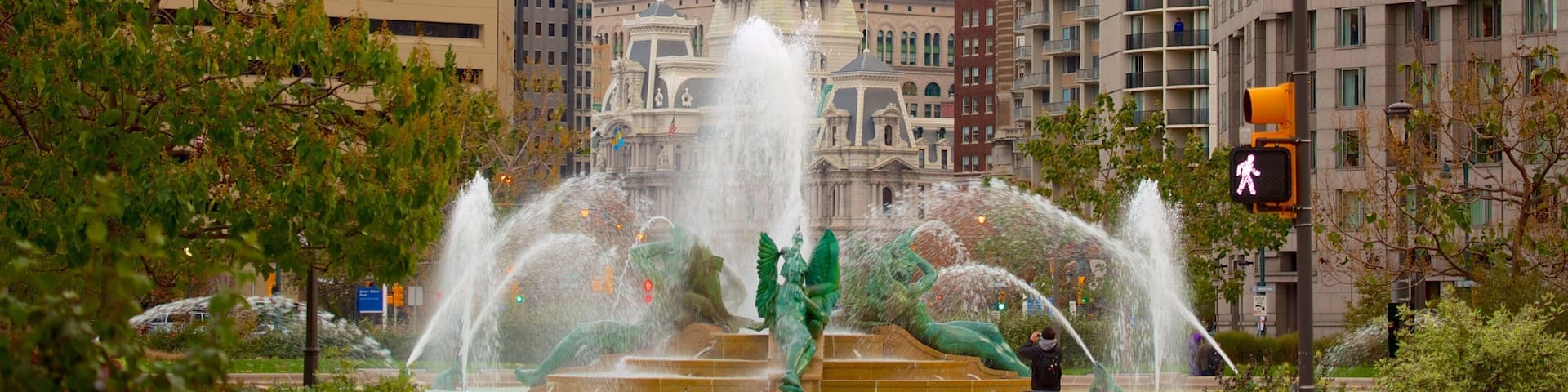 Benjamin Franklin Parkway featuring heritage architecture, a fountain and a city