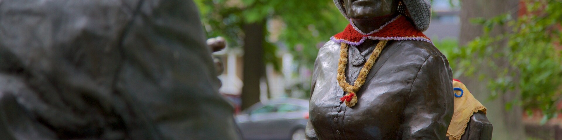 Susan B. Anthony Square featuring a park and a statue or sculpture