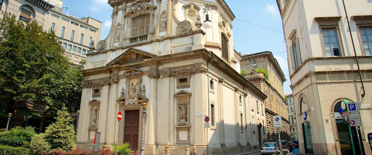 Milan featuring heritage architecture, street scenes and a church or cathedral