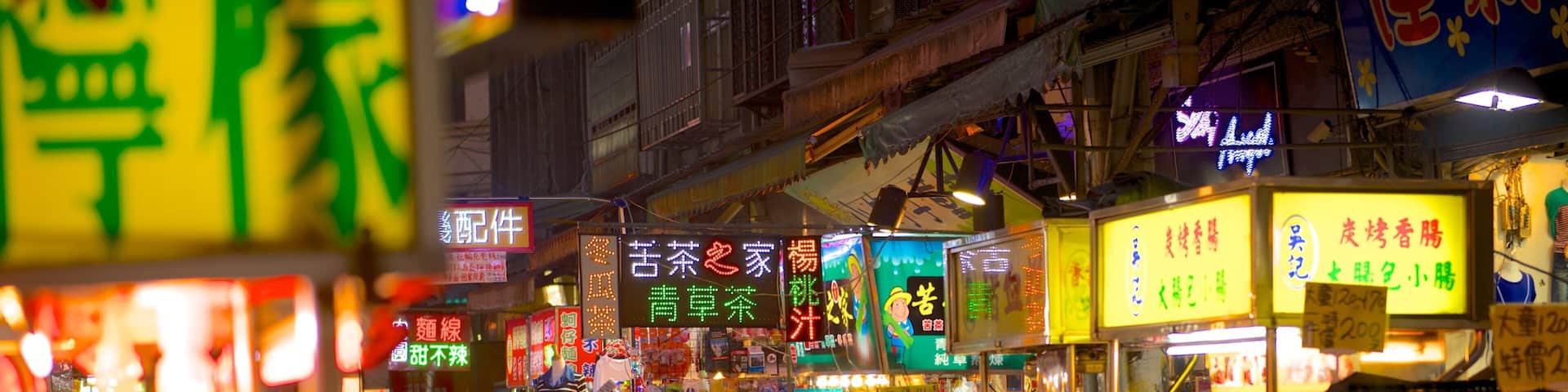Condado de Taoyuan que incluye escenas nocturnas, una ciudad y mercados