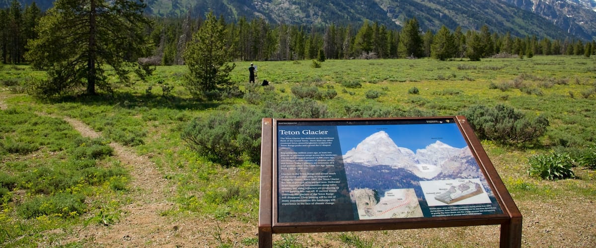 Teton Glacier Turnout featuring mountains, landscape views and signage